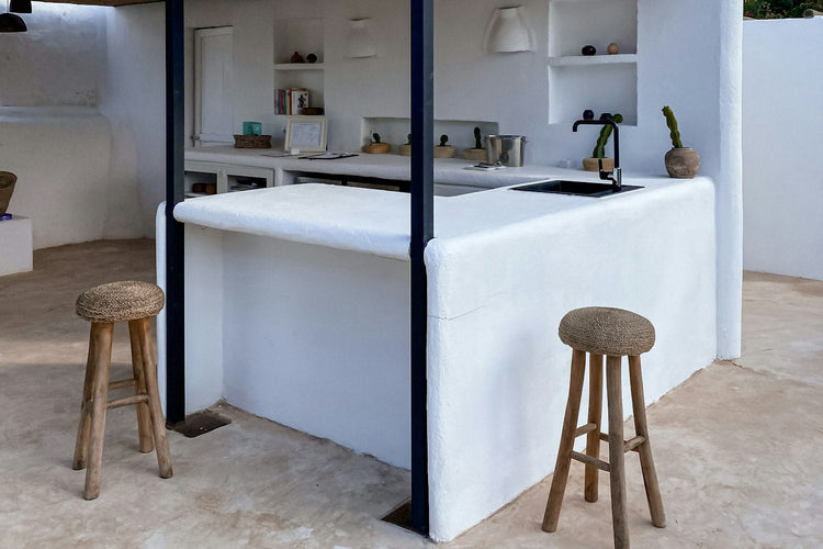 Outdoor bar with stools